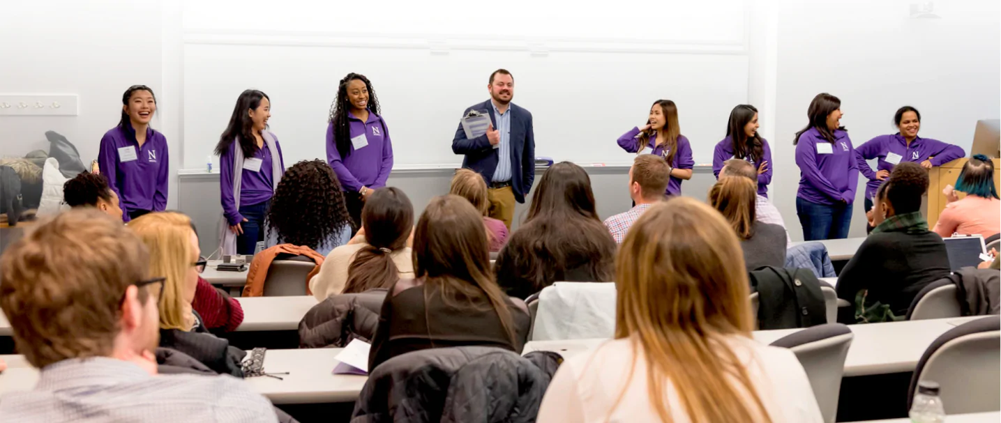 custom-web-design-northwestern-university-background-image A group of people in the classroom