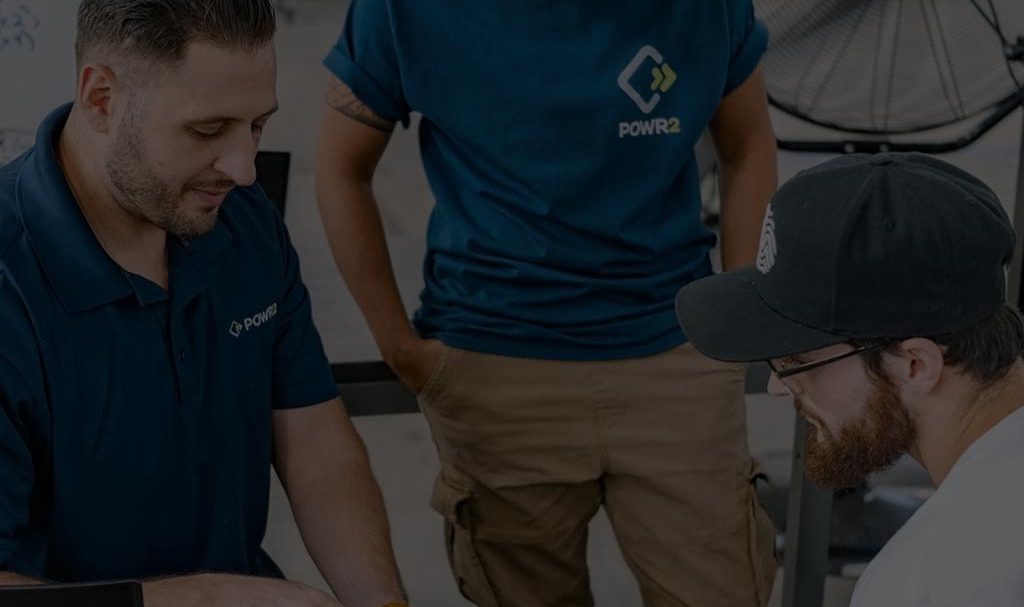 custom-website-design-company-Powr2 powr background image with three employees
