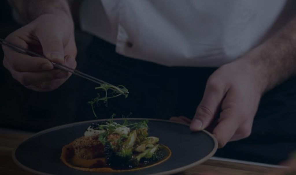 custom-website-design-company-ventura-foods-background-image person cooking